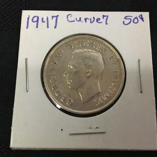 1947C7 Fifty Cent. Curved 7.