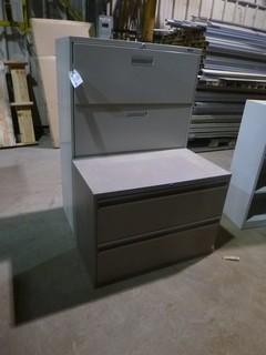 (1) 4 Drawer Filing Cabinet, (1) 2 Drawer Filer Cabinet