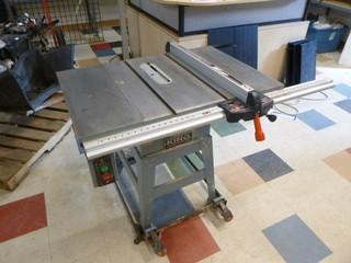 2002 King Canada 10" Table Saw, Model KC-10GC, 230V, 9A, 1 Phase, Cast Iron table top, Retractable casters.