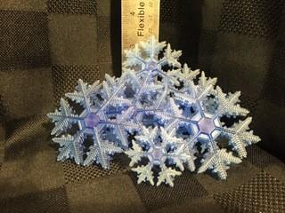 Quantity of Plastic Blue Small & Large Snowflakes.
