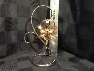 Swarovski Crystal Golden Shine Snowflake Ornament 2012 on Display Stand.