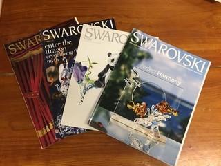(4) Swarovski Magazines.
