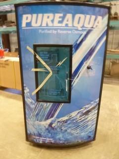 Pure Aqua Purified By Reverse Osmosis 30"x38"x70", Fills 18.9L and 2 Gal. Containers *NOTE: Piece Missing Off Waste Water Sump, Broken Door, Missing RO Unit*