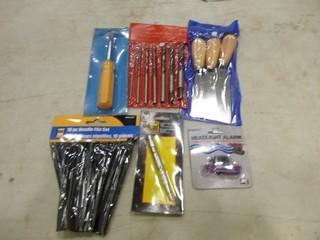 3PC Putty Knife Set, (1) 10PC Needle File Set, (1) Headlight Alarm, (1) 7PC Brad Point Drill Bit Set, (1) Pocket Air Blow Gun, (1) 4 in 1 Screw Driver Set (A1)