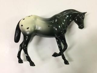 Hartland Horse Spotted Black And White Horse With Leg up.