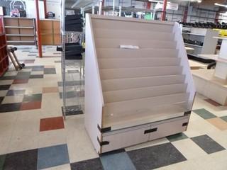 Approx. 48in X 24in X 56in 9-Tier Display Stand, Pull out lower drawer, On Casters to move easily.