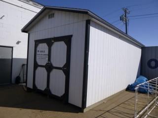 12' x 24' Outdoor Wood Shed c/w Triple Puck Locks, Upgraded Hinges, Built In Shelving and Mezzanine 9' Ceilings *NOTE: Buyer Responsible For Load Out* 