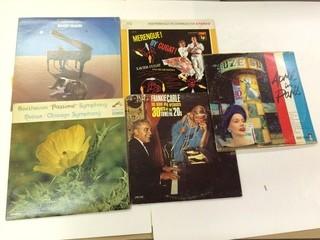 5 Assorted Vinyl's.