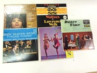 5 Assorted Vinyl's.