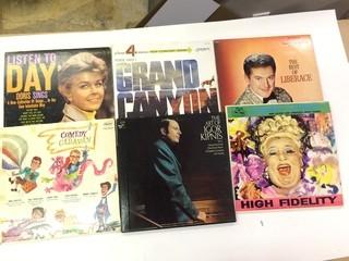 6 Assorted Vinyl's.