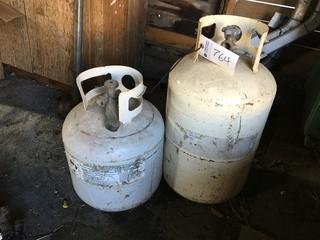 (1) 20Lb, (1) 30Lb Propane Tanks.