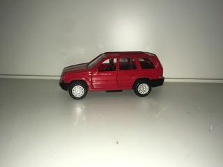 Red Jeep Diecast Model.