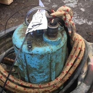 Oil Drain Pan & Submersible Pump.