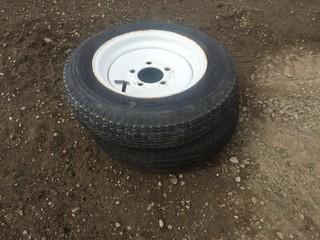 (2) Load  Star Trailer Tires w/Rims.