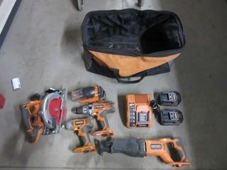 Ridgid Power Tool Set. Including Circular Saw, Drill, Impact t Drill, Reciprocating Saw, Light, Charger & (2) Batteries.