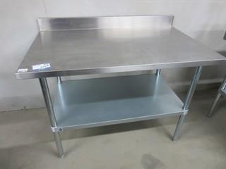 Stainless Steel Table 5' Length, w/ undershelf and backsplash.