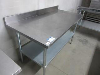 Stainless Steel Table 4' Length, w/ undershelf and backsplash.