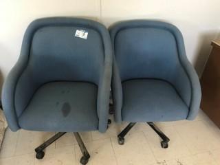 (2) Blue Office Chairs.