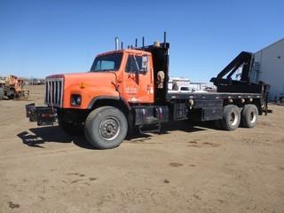 1991 International Boom Truck c/w Cummins C400, 8LL Transmission, Showing 9,223 Hours, 256" W/B, PTO, 425/65R22.5 Tires At 70%, 12R22.5 Rear Tires At 5-60%, Knuckle Boom (No Info), 3 Section, Rear Outrigger, Hyd Winch, 20' Deck Double Frame, VIN 1HTGLADTXMH331274
