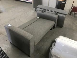 Grey Fabric Couch With Slide Out Foot Stool, Missing Back.