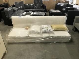 White Fabric Couch With (3) Pillows, Missing Chaise & (1) Leg.