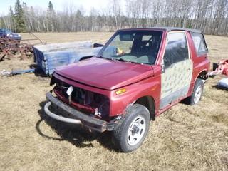 1998 Chevrolet Tracker Jeep C/w A/T. Showing 168,405kms. VIN 2S3TA02C9W6407558. *Note: Running Condition Unknown*