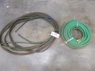 (1) 100' Oxy Acetylene Hose, (1) 50' Unused Oxy Acetylene Hose (EE1-3-1)