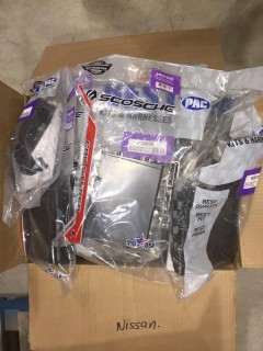 Quantity of Assorted Nissan Car Stereo Installation Kits.