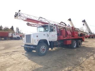 1979 Ford 900 Water Drill Truck c/w Detroit Diesel, 8LL Manual Transmission, Showing 633,065 KMS, VIN U902VDC7775 315/80R22.5 Front Tires At 10%, 11R22.5 Rear Tires, Hyd Stabilizer Jack, Qty of 20' x 3 1/4" Drill Pipe, Hyd Pump,  *NOTE: Runs*
