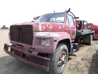 1985 Ford Water Drill Truck  c/w 8.2L Detroit Diesel, Manual Transmission, Showing 539,629 KMS, GVWR 28,000LB, 10.00-20 Tires, Front Axle Rating 4,082KG, Rear Axle Rating 8,618KG, Hyd Front and Rear Stabilizer Jack Gardner Denver Pump, Qty of 20' x 3 1/4" Drill Pipe, VIN 1FDPK74N8FVA28322 *NOTE: Engine Turns Over, Missing Drilling Rig, Missing RR Stabilizer Jack*