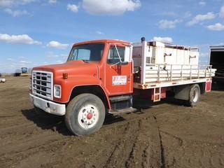 1979 International 1824 Flat Deck Truck c/w Diesel Engine, Manual Transmission, Showing 156,140 KMS, 10.00R20 Front Tires, 11R22.5 Rear Tires, 17' x 8'5" Deck, Tool Storage Boxes, 12' x 4' Mud Tank, Qty of PVC Pipe, VIN AA182JCA27256 *NOTE: Parts Only*