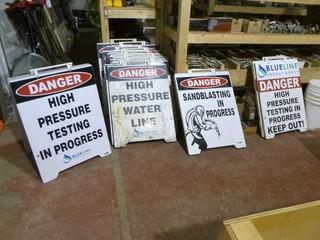 Qty Of (13) High Pressure Water Line, (4) Testing In Progress, (2) Keep Out And (1) Sandblasting In Progress Signs