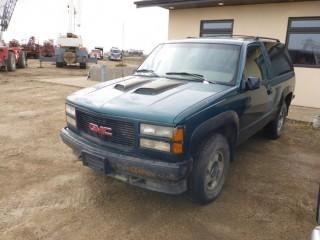 1995 GMC Yukon c/w 5.7L V8, 2 Door, 265/75R16 Tires, VIN 3GKEK18K7SG504432 *NOTE: Running, Drivers Door Mechanism Broken, Rear Window Missing*