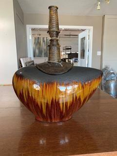 Ceramic Metal Vase  5" wide by 16" long by 21" High.