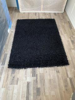 Black Shag Rug 60" x 84".