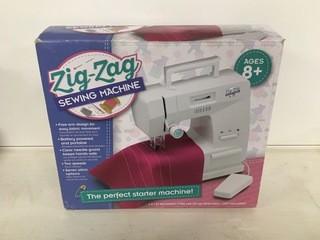 Zig-Zag Sewing Machine.