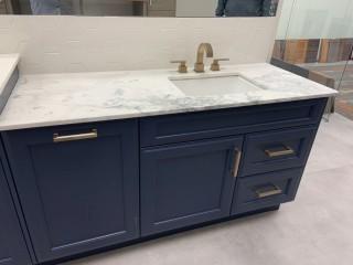 Showroom Bathroom Vanity, countertop, sink and Faucette *Buyer Responsible For Dismantle and Load Out, Located at 1629 - 32 Ave N.E., Calgary, AB. For More Info Call Graham @ 403-968-7697*  