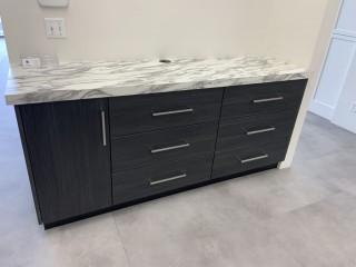 Showroom Cabinet with countertop *Buyer Responsible For Dismantle and Load Out, Located at 1629 - 32 Ave N.E., Calgary, AB. For More Info Call Graham @ 403-968-7697*    