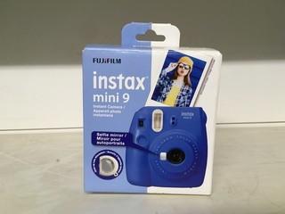 Instax Mini 9 Instant Camera W/1 PKG Of Film.