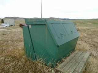 Selling Offsite - 4 Yd. Hyd. Refuse Bin. (A) Located just north of Calaway Park For Viewing Call Jon (780)621-6499.
