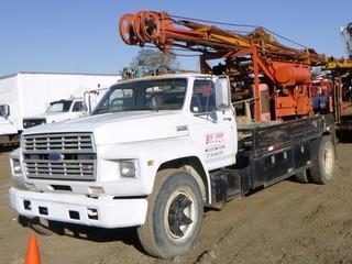 1985 Ford Water Well Drill Truck c/w 370-2V, 13 Speed, Showing 169,911 KMS, A/C, GVWR 9,616KG, Rear Stabilizer Jacks, Cable Drill Tool Water Drill Rig, 4 Cyl Engine, Front Tires 11R22.5, Axle Rating 3,175KG, Rear Axle Rating 6,440KG, VIN 1FDNF60H5FVA36805 *NOTE: Runs*