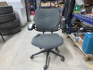 Green Rolling Office Chair.