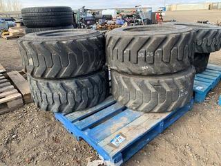 Quantity of (4) 12 x 16.5 Skid Steer Tires.