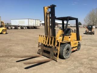 Cat V80D 8,000 LB Forklift c/w 4 Cyl Power on LPG, FOPS, 2 Stage Mast, 32x12.1-15 Front, 7.00x12 Rear Tires, Showing 2,666 Hours. S/N 31S710. Note:  Requires Repair.