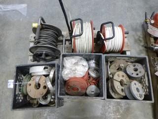 (2) Water Level Controls, (3) Crates of Assorted Well Seals, (1) Reel Extension Cord