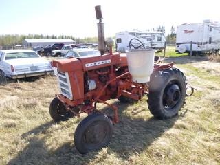 McCormick 140 Farmall Tractor C/w 4-Cyl, Manual. *Note: No Battery, Seat Rusted*