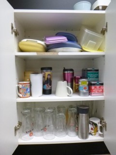 Qty Of Glasses, Coffee Mugs, Tupperware And Teas *Note: Cupboard Not Included*