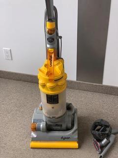 Dyson Upright Vacuum With Attachments.