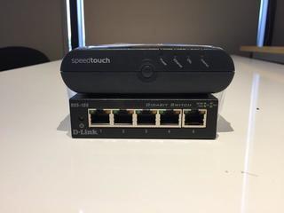 (1) D-Link DGS-105 Metal 5 Port Gigabit Switch & (1) Router.