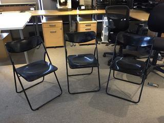 (3) Plastic Folding Chairs.